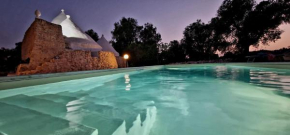  Trullo Tarantini con piscina privata  Латиано